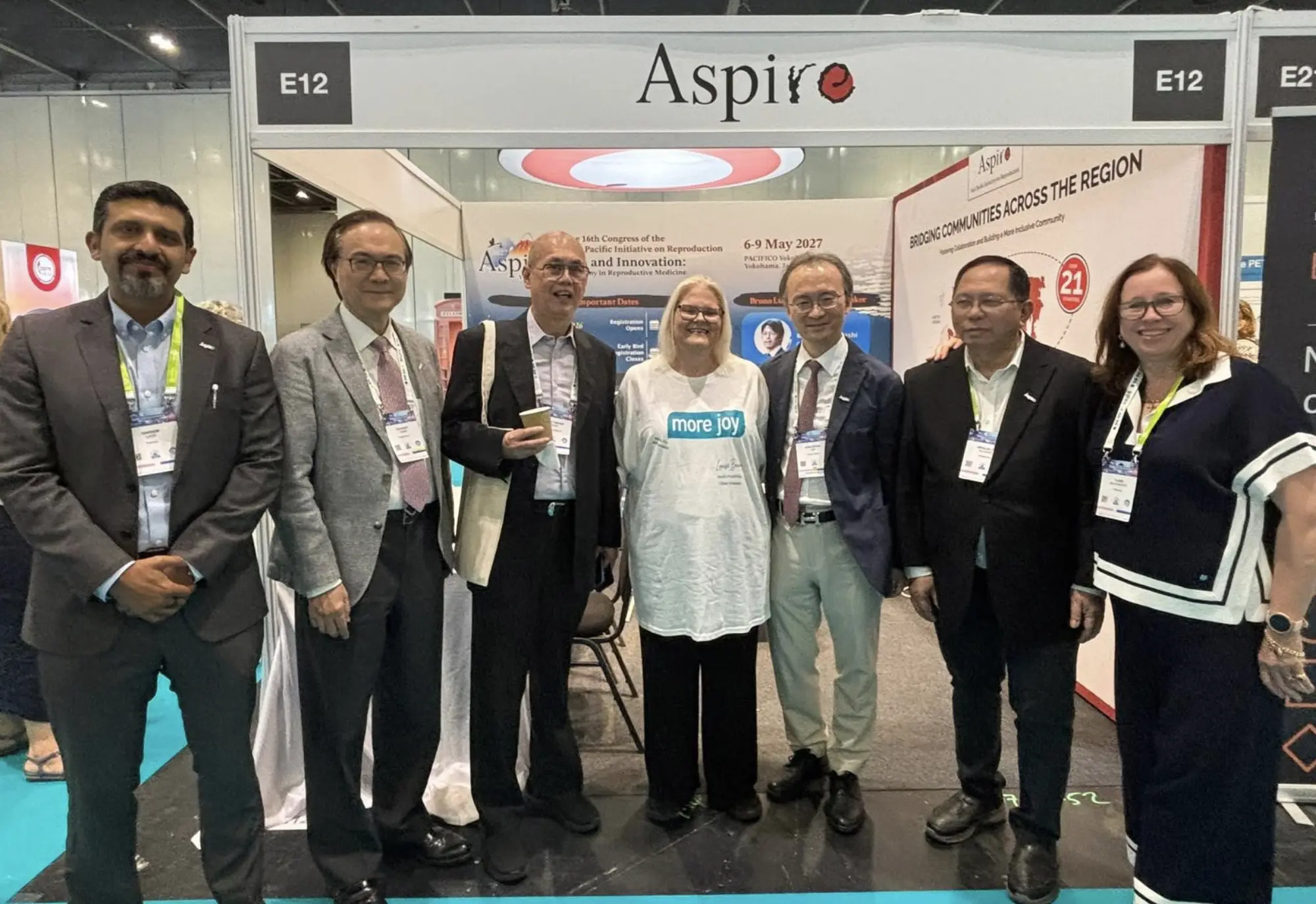 ASPIRE leadership with Louise Brown at ASPIRE booth at ESHRE 2026